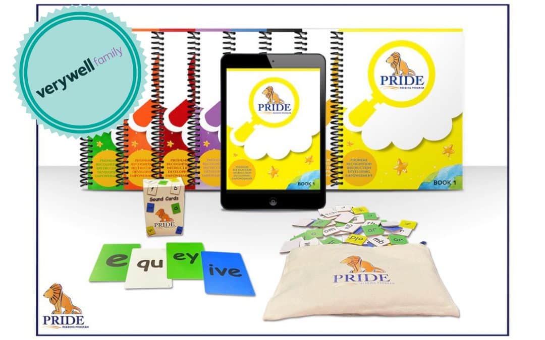 A photo of PRIDE Reading Program Workbooks, sound cards, letter tiles, and a badge with "Very Well Family" on it in the top left corner